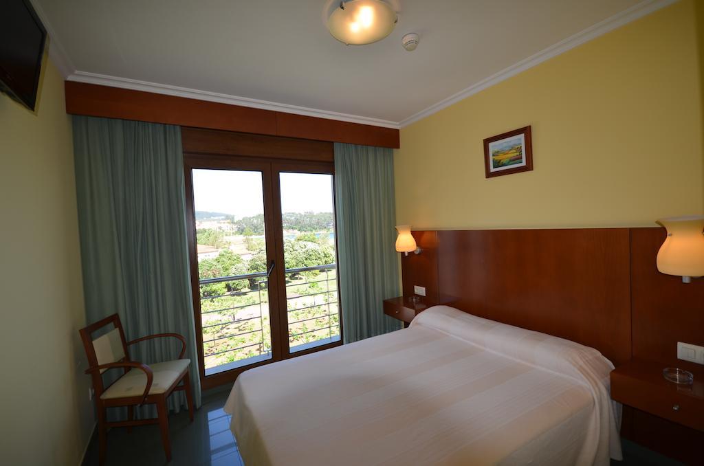 Hotel Maracaibo Portonovo Camera foto
